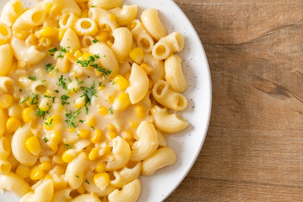 Macaroni creamy corn cheese on plate