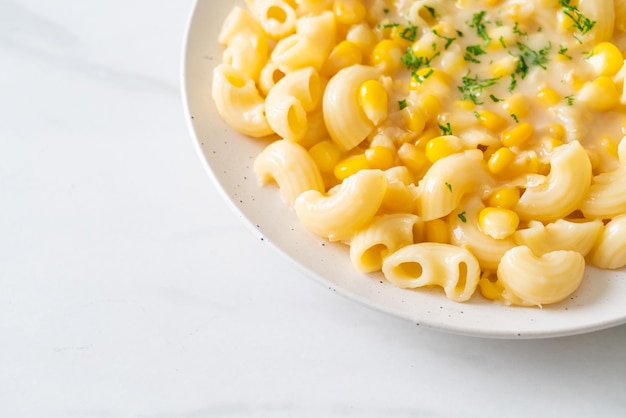 Macaroni creamy corn cheese on plate