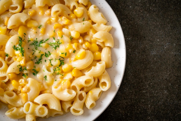 Macaroni creamy corn cheese on plate