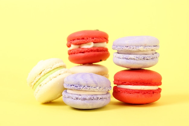 Macaroons on a colored background top view