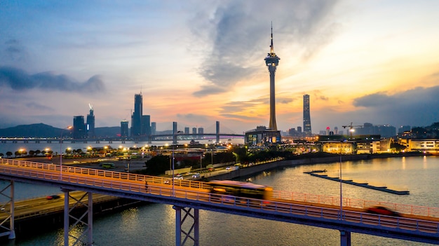 Macau city skyline at sunset with Macau Tower in twilight, Aerial view, Macau, China.