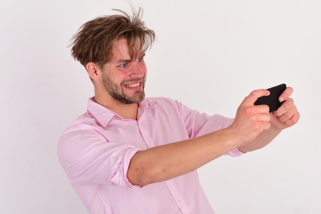 Macho with cellphone on white background Communication concept