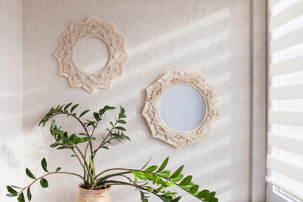 Macrame mirror and wreath on a white wall Ecostyle Natural materials