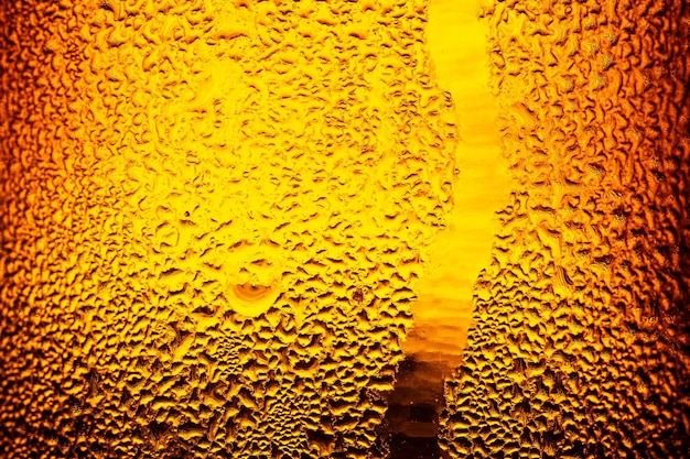 macro beer bottle background,Water drops texture on the bottle of beer. Abstract background,Water