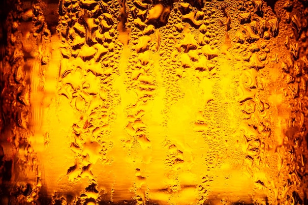 macro beer bottle texture,Texture of water drops on the bottle of beer.