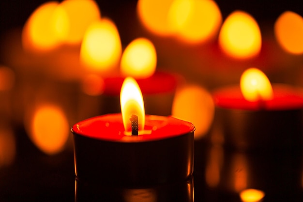 Macro candle,Burning candles on dark background