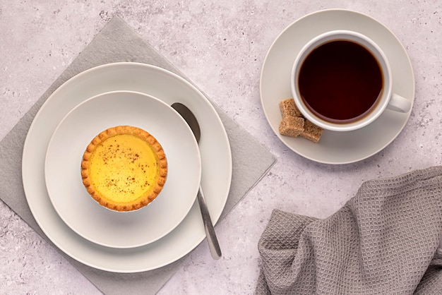 Macro food photography of tea and custard tart