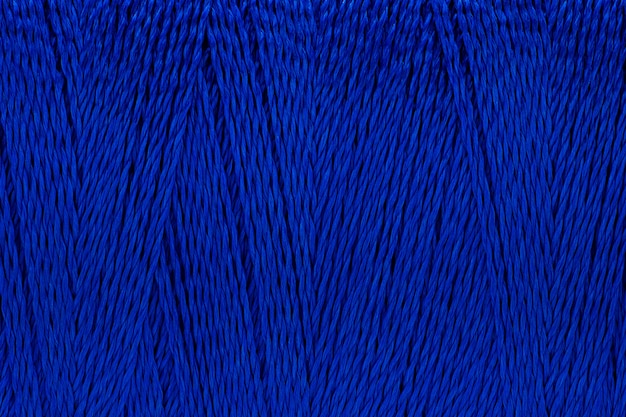 Macro image of thread texture blue color background