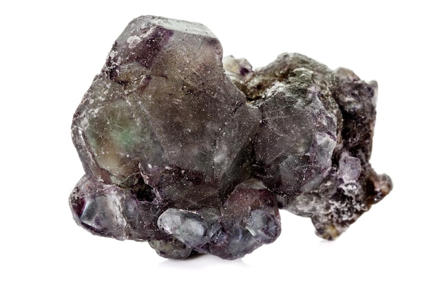 Macro mineral fluorite stone on white background