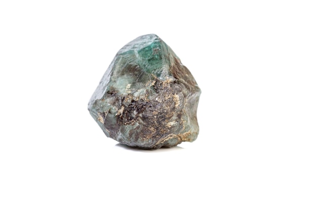 Macro mineral stone alexandrite bluish green with fluorescent light on a white background