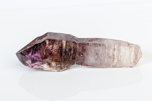 Macro mineral stone Amethyst on smoky quartz on a white background