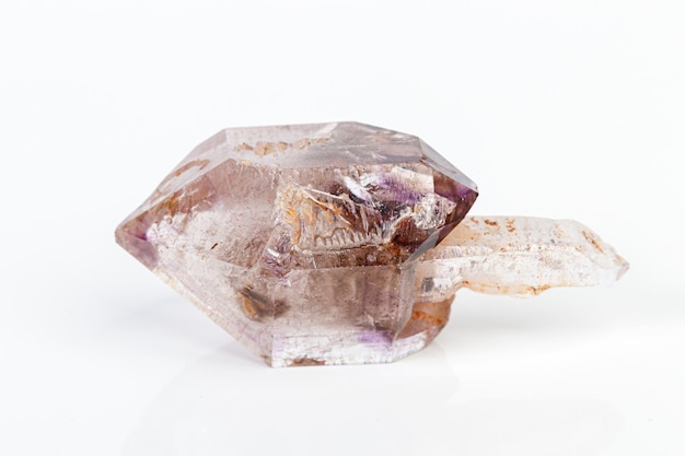 Macro mineral stone Amethyst on smoky quartz on a white background