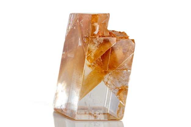 Macro mineral stone Calcite on a white background