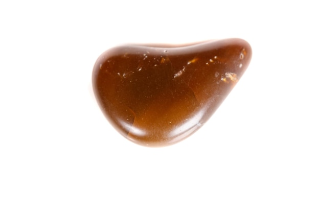 Macro mineral stone Carnelian on white background