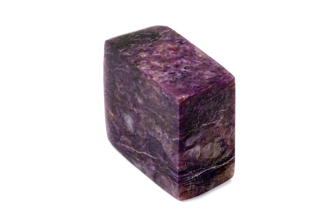 Photo macro mineral stone charoite on a white background