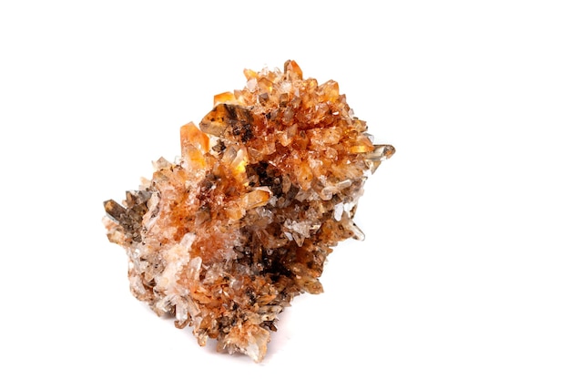 Macro of mineral stone Creedite on microcline on white background