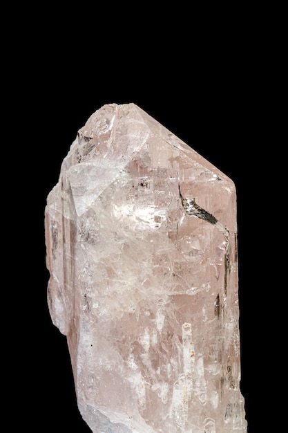 Macro mineral stone Danburite on a black background