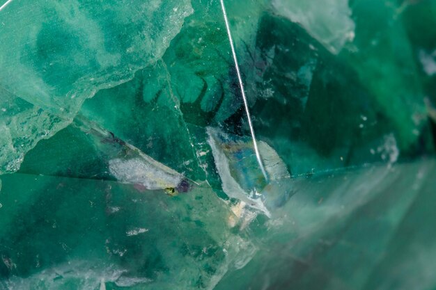 Macro mineral stone Fluorite crystal on a black background