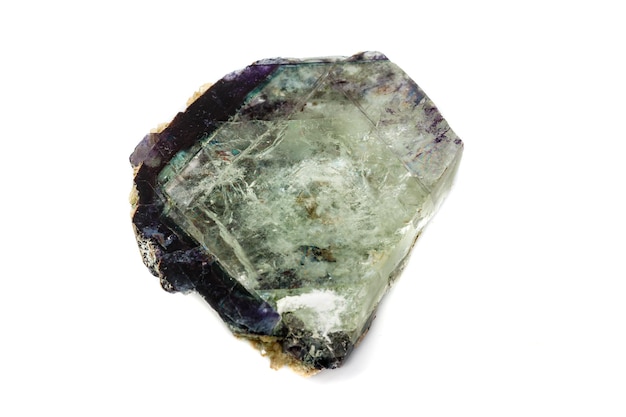 Macro of a mineral stone Fluorite on a white background