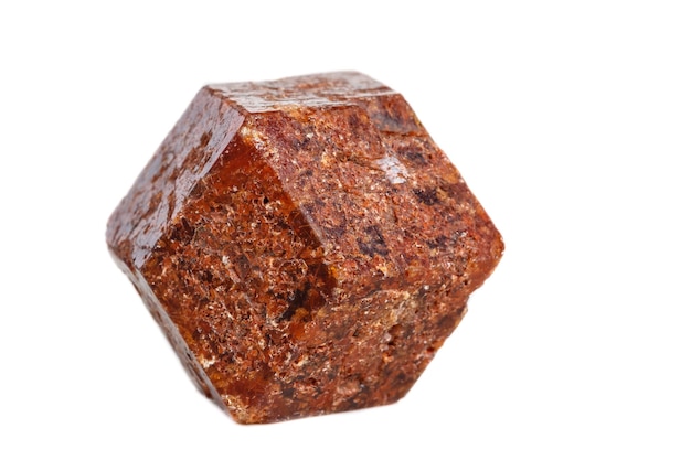 Macro mineral stone Garnet on a white background