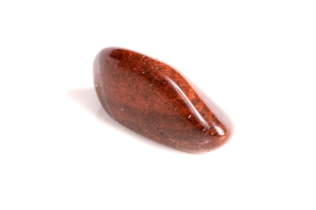 Macro mineral stone jasper on a white background