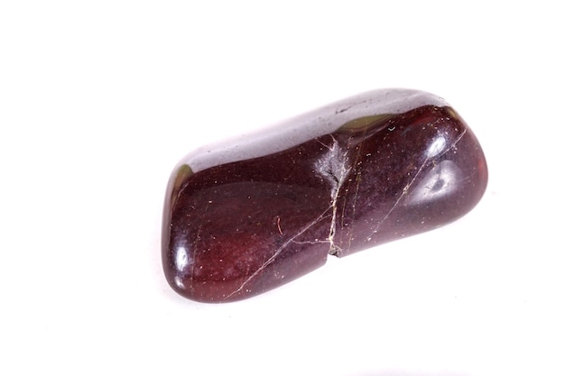 Macro mineral stone jasper on a white background