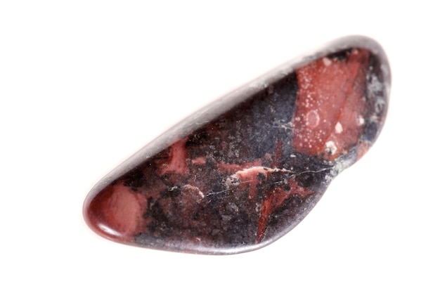 Macro mineral stone jasper on a white background