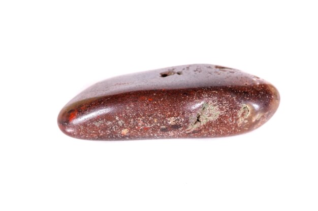 Macro mineral stone jasper on a white background