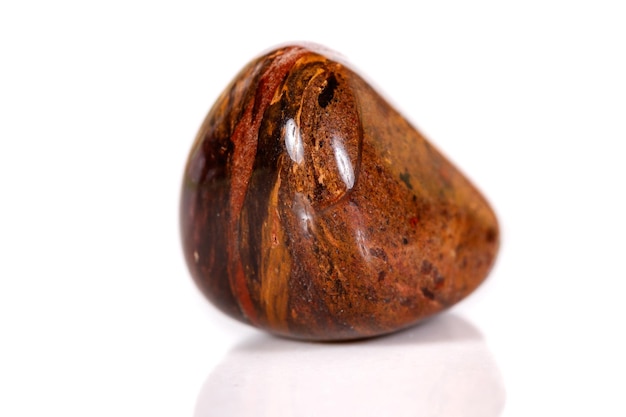 Macro mineral stone jasper on a white background