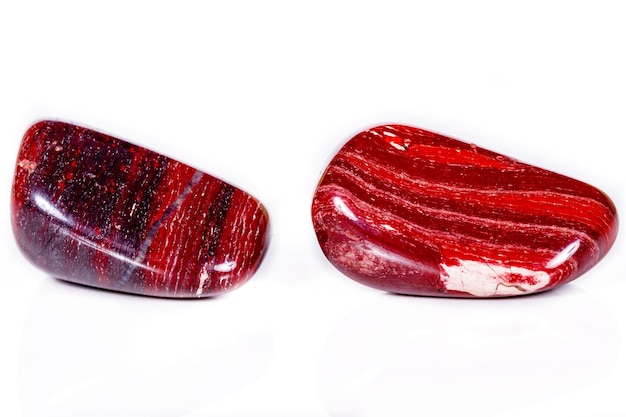 Macro mineral stone jasper zebra iron on a white background