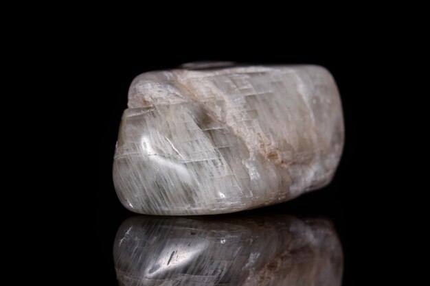 Macro mineral stone Moonstone on black background