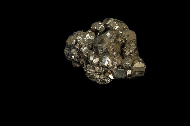 Macro mineral stone Pyrite on a black background