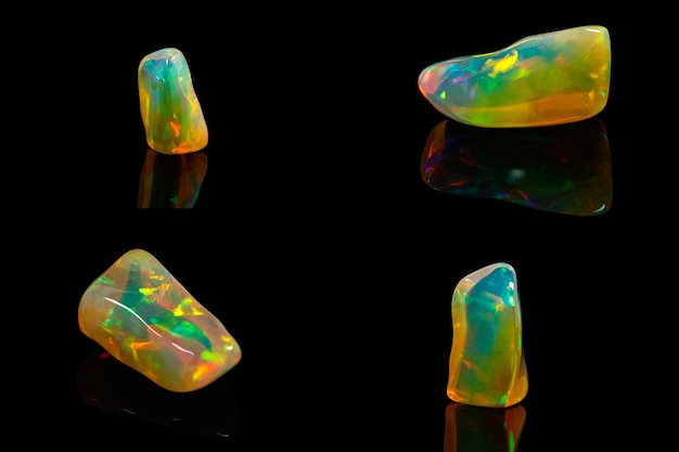 Macro mineral stone rare and beautiful opals on a black background