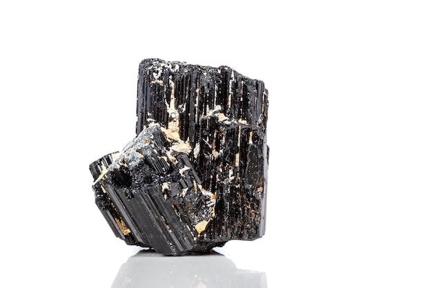 Macro mineral stone sherle schorl black tourmaline on white background