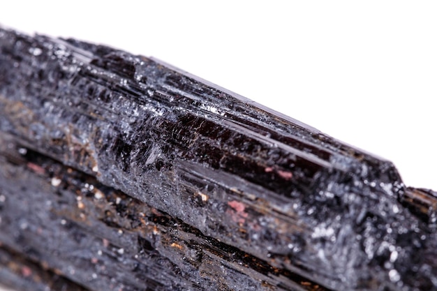 Macro mineral stone sherle schorl black tourmaline on white background