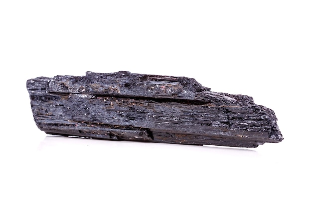 Macro mineral stone sherle schorl black tourmaline on white background