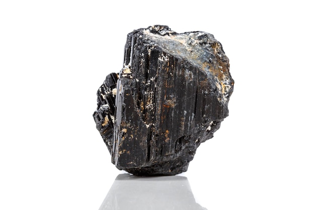 Macro mineral stone sherle schorl black tourmaline on white background