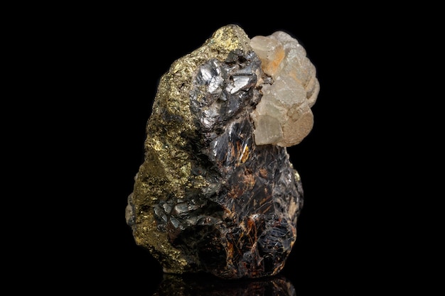 Macro of a mineral stone Sphalerite with fluorite and pyrite on a black background close up