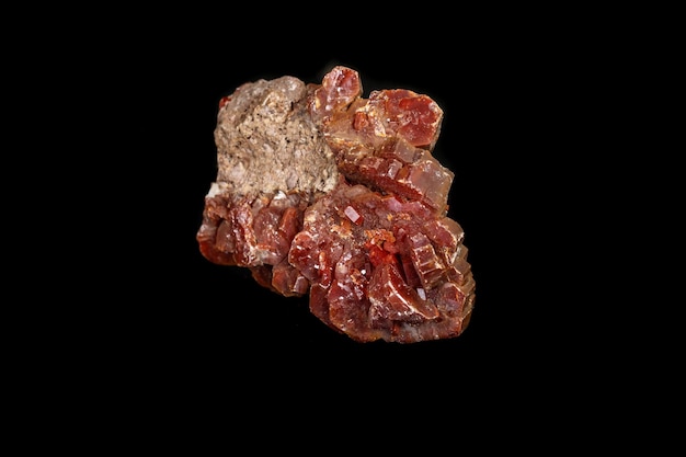 Macro mineral stone Vanadinite on a black background