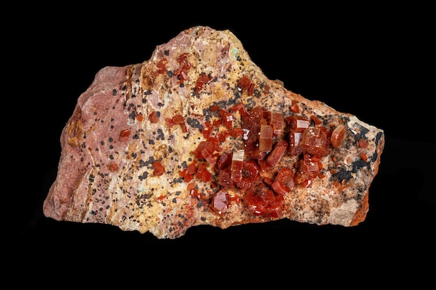 Macro mineral stone Vanadinite on a black background