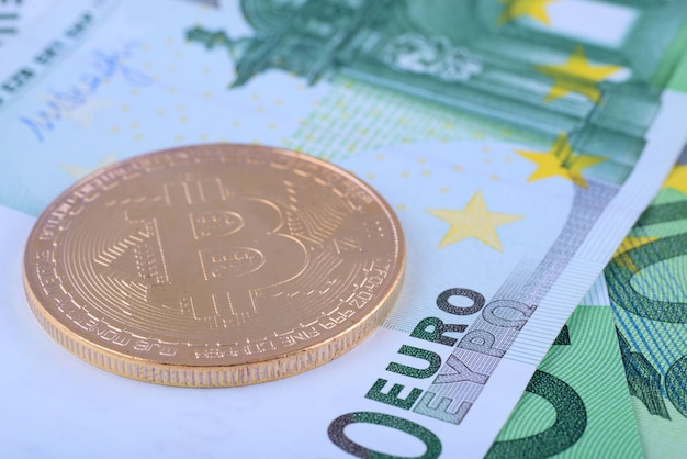 Macro photo - background of the European currency, the Euro, and bitcoin