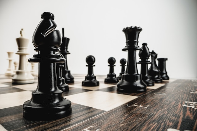 Macro photo of chess pieces on a chess board