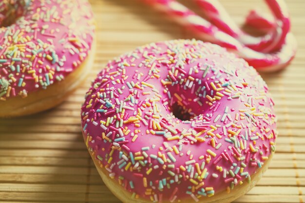 macro photography of a pink donut