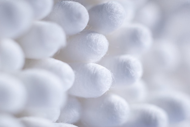 Macro shot of the heads of white cotton swabs