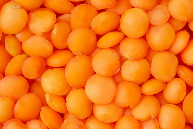 Macro shot of red lentils background. Top view, overhead