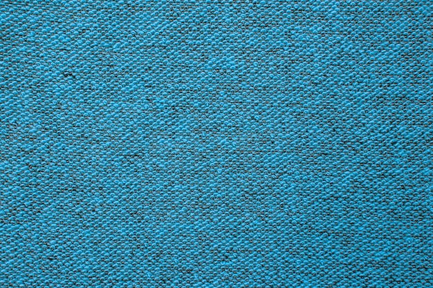 Macro shot of a terrycloth texture background. Textile floor covering. Knotted-pile carpet