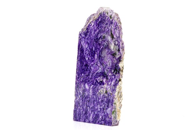 Macro stone Charoite mineral on white background