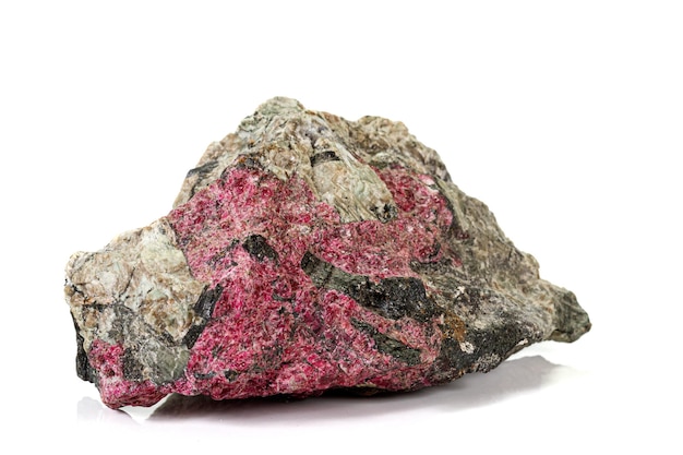 Macro stone Eudialyte mineral on white background