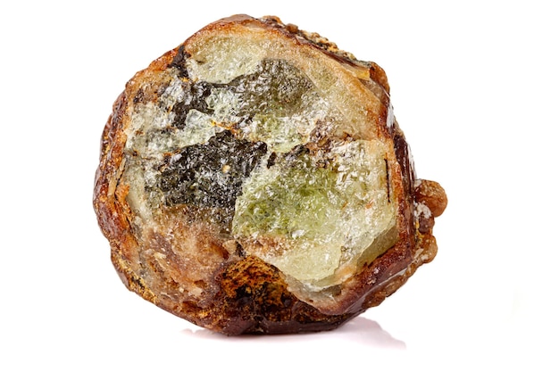 Macro stone Grossular mineral on white background