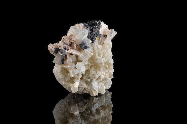 Macro stone mineral Calcite Galena pyrite on a black background